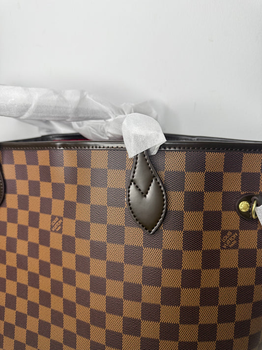 NEVER DAMIER PIEL