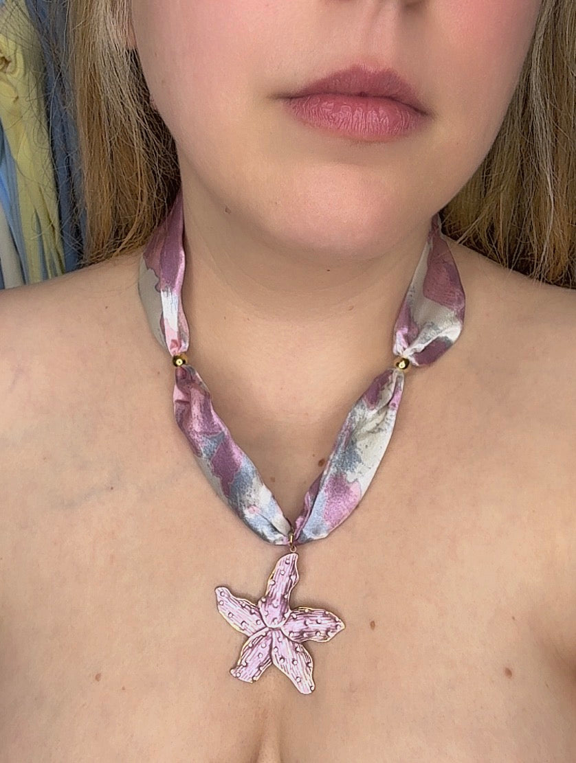 Colgante estrella rosa