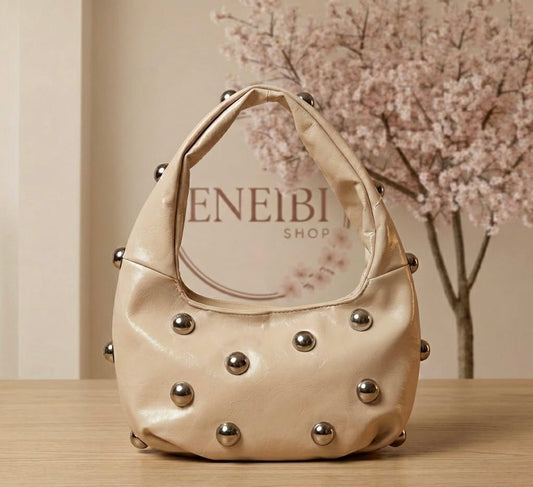 Bolso beige tachuelas